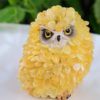 Figurine owl encrusted with Baltic Amber