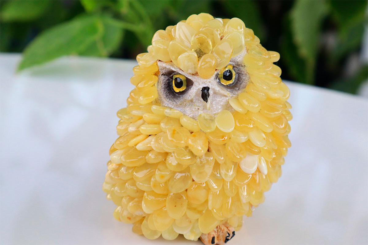 Figurine owl encrusted with Baltic Amber