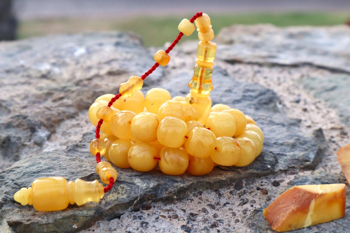 Baltic amber prayer beads from one stone